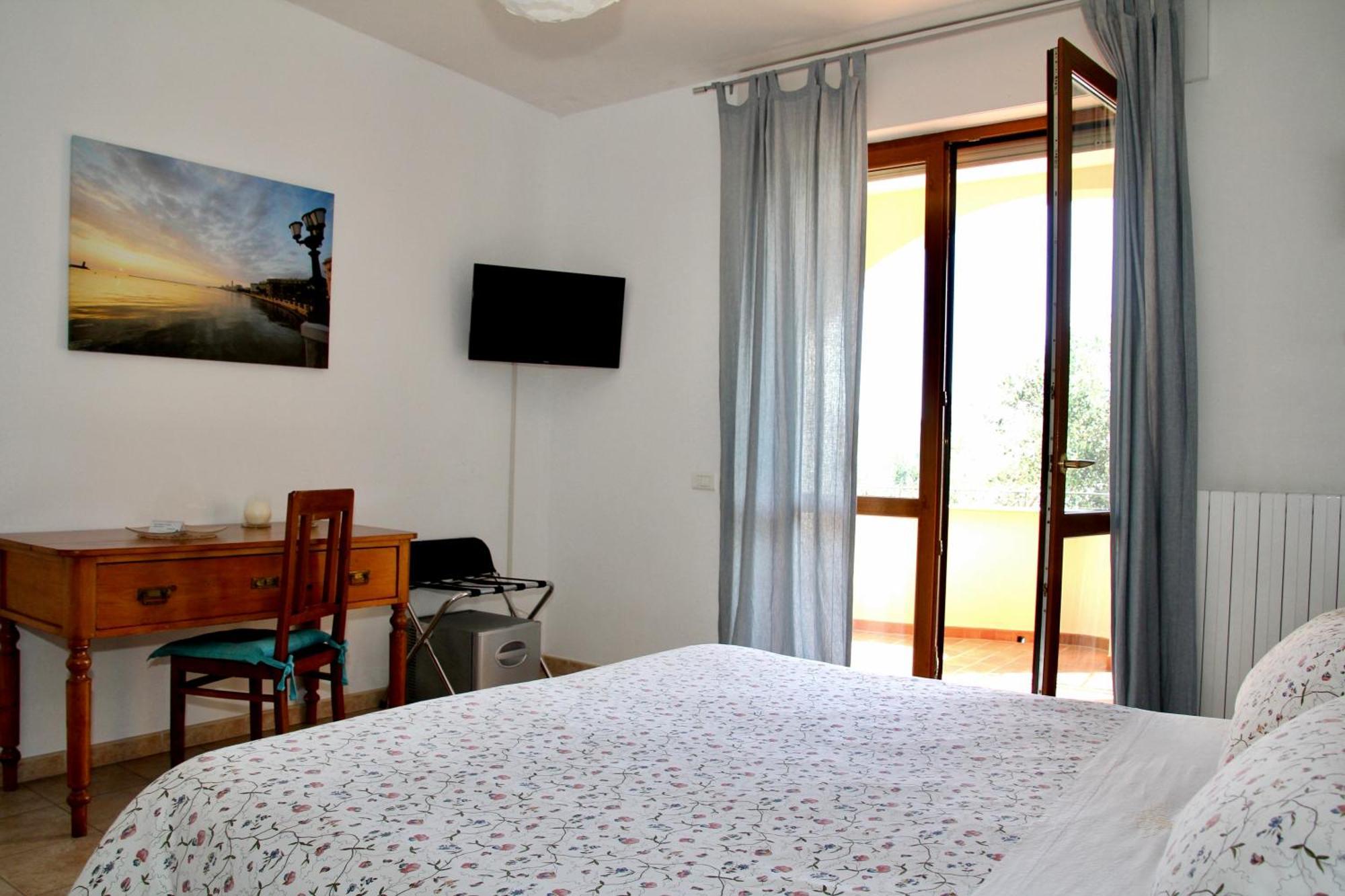 Doppelzimmer mit Balkon und Meerblick